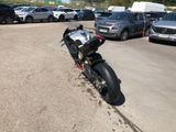 a motorcycle that is parked in a parking lot