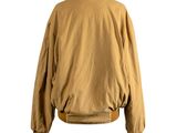 the back of a tan bomber jacket on a mannequin mannequin mannequin mannequin mannequin mannequin mannequin manne