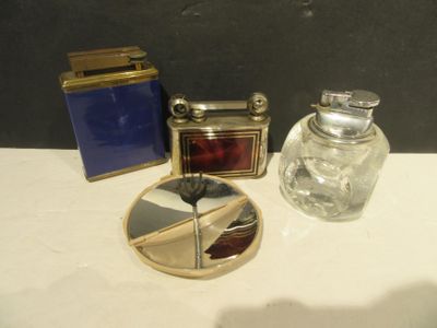 a small glass jar and a small glass jar on a table