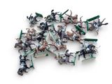 many figurines of different types of animals on a white surface