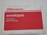 a red and white sign that says envelopes on it