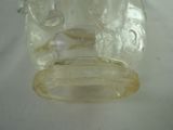 a clear glass jar with a lid on a table