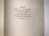an open book with a picture of a cat on the cover