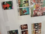 a refrigerator with a bunch of stamps on it