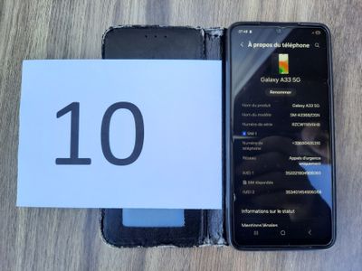 a picture of a cell phone and a note with the number 10 on it