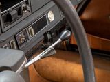 a steering wheel and dashboard of an old car