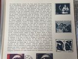 an open book with a picture of a woman on it