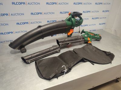 a cordless blower and other tools on a table