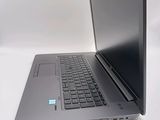a laptop that is sitting on a white table