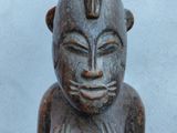 an image of a statue of a man with a hat on his head