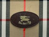 burberry ' s logo on a burberry ' s brown and tan checkered purse