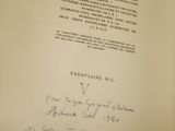 a book with a handwritten title on it