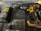two tools in a toolbox that are sitting on the floor