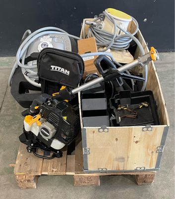 a box full of tools sitting on top of a pallet