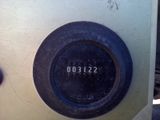 a close up of a clock on the side of a building