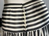 black and white striped skirt with zippers on a mannequin mannequin mannequin mannequin mannequin mannequin mannequin mann