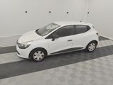 a picture of a white car parked in a garage