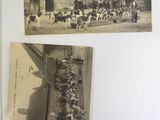 several old black and white photos of people and animals in a village