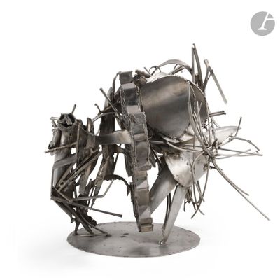 sculpture of a horse made of scrap metal on a base
