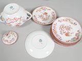 several pieces of chinese porcelain are arranged on a table