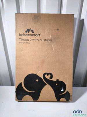 une boîte en carton sur laquelle est représenté un couple d'éléphants