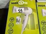 boxes of high one hair dryers are stacked on top of each other