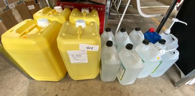 a lot of yellow and blue jugs sitting on the floor