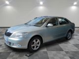 a picture of a silver car parked in a garage
