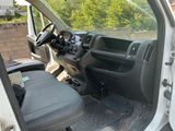 a picture of the inside of a van with the driver ' s seat down