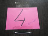 a piece of paper with the number four on it