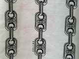 a close up of a white shirt with a chain pattern on it