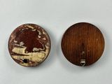 two pieces of wood with a picture of a bear on it