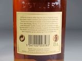 a bottle of liquor with a barcode label on it