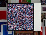 a picture of a painting on a easel in a room