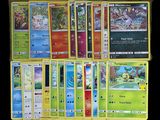 beaucoup de cartes pokemon sur la table