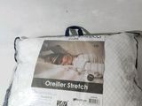 a pillow that has a picture of a cat sleeping on it
