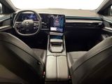 the interior of a car with a steering wheel, dashboard, and touch screen