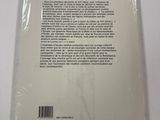 the back cover of a book on a white surface