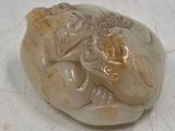 a picture of a white stone with a carving on it