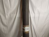 a baseball bat sitting on top of a white sheet