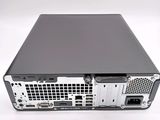 the back of a computer with a hard drive and hard drive on top of it