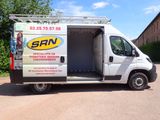 a van that is parked on the side of the road