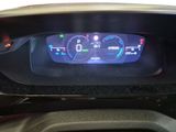 the dashboard of a car with a digital display on it
