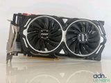 a close up of a video card with a fan on top of it