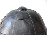 a close up of a helmet on a table