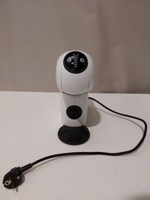a camera that is sitting on a table next to a mouse
