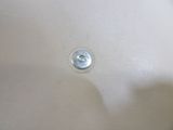 a close up of a sink with a metal faucet in it