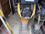 a yellow and black fire hydrant in a garage