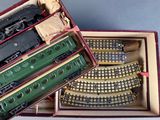 a box with a train set in it on a table
