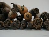 many different types of carved objects on the table